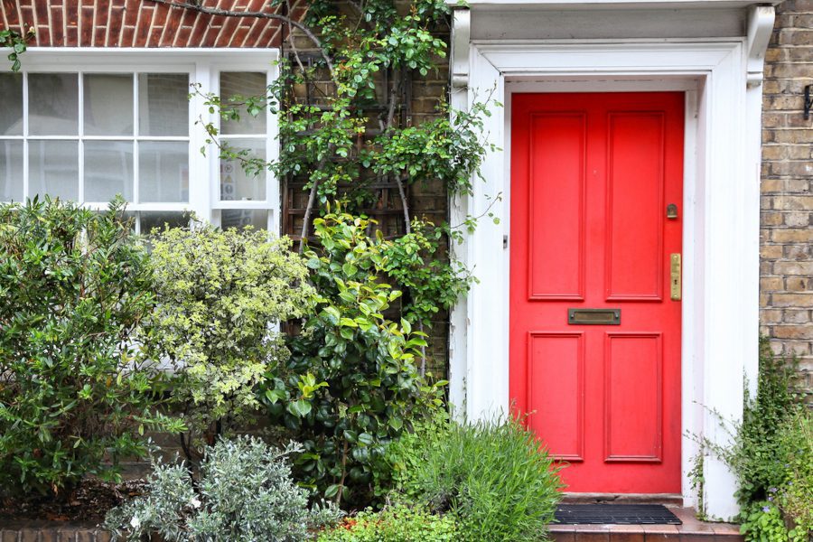 A red painted door has many meanings historically