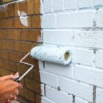Painting a brick house